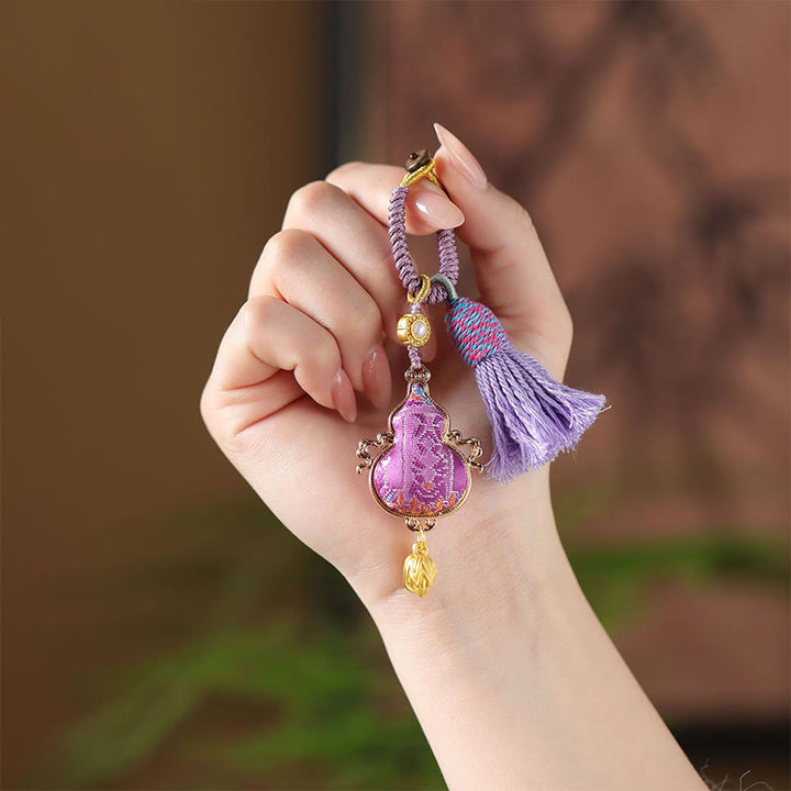 Buddha Stones Sleutelhanger met brokaatmotief en gelukssymbool - image 3