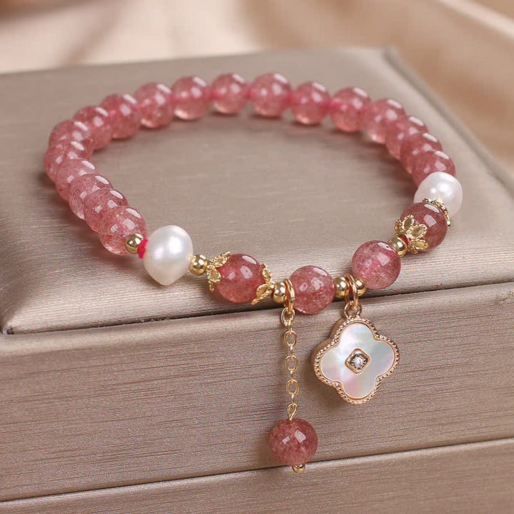 Buddha Stones Ronde Armband met aardbeikwarts, parelschelp en klavertje vier. - image 1