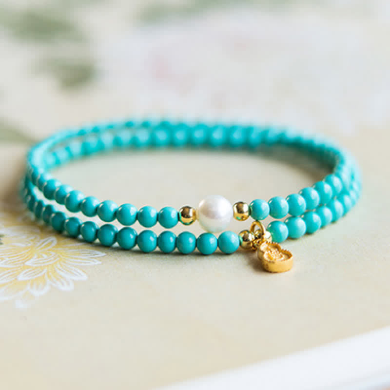 Buddha Stones Handgemaakte Armband met hanger in de vorm van een turkooizen parel en dubbele bescherming. - image 1