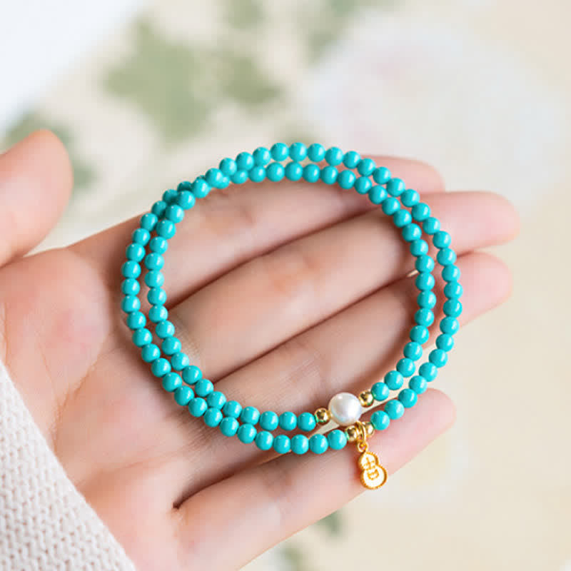 Buddha Stones Handgemaakte Armband met hanger in de vorm van een turkooizen parel en dubbele bescherming. - image 3