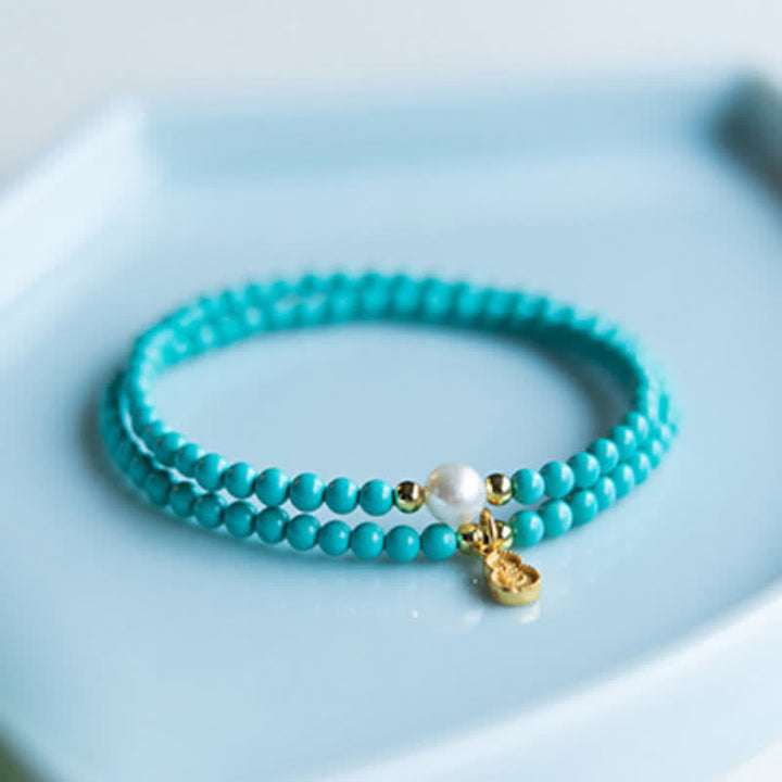 Buddha Stones Handgemaakte Armband met hanger in de vorm van een turkooizen parel en dubbele bescherming. - image 2