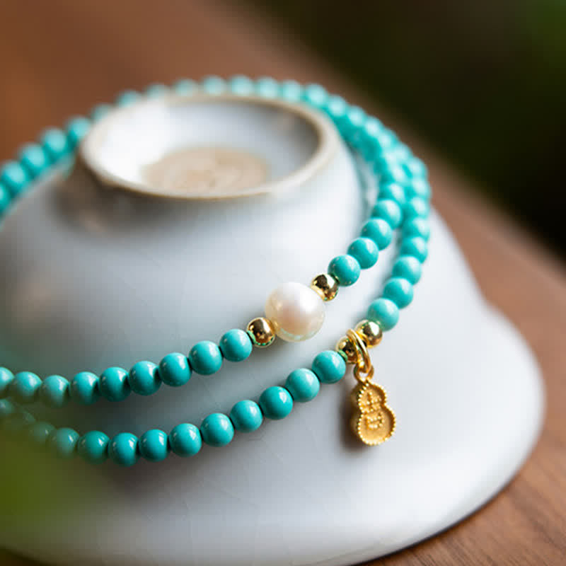 Buddha Stones Handgemaakte Armband met hanger in de vorm van een turkooizen parel en dubbele bescherming. - image 4