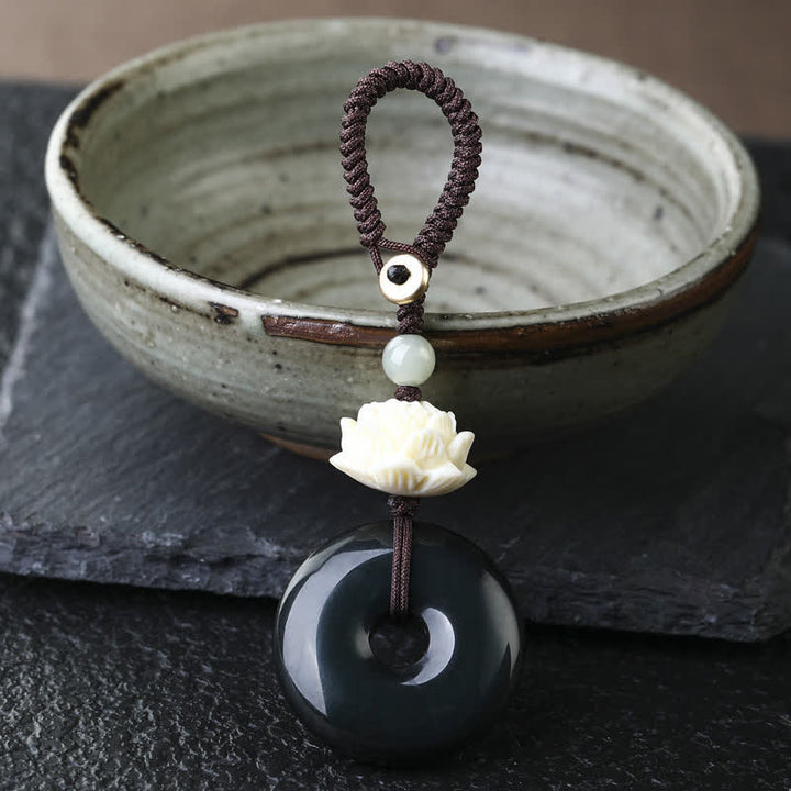 Buddha Stones Regenboogobsidiaan lotus vredesgesp bescherming Sleutelhangers - Lotus - Regenboog Obsidiaan Vredesgesp Sleutelhanger - Regenboogobsidiaan (kleur verandert in het licht) - image 2