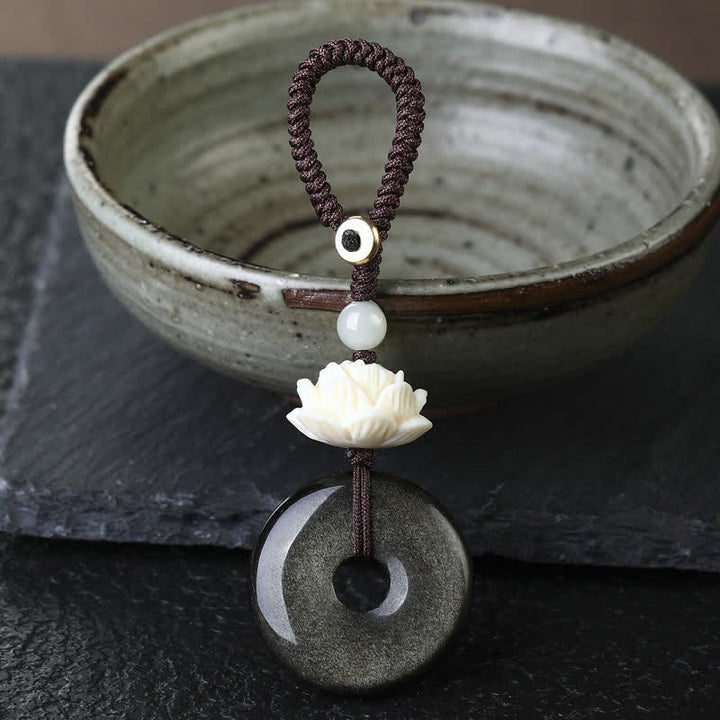 Buddha Stones Regenboogobsidiaan lotus vredesgesp bescherming Sleutelhangers - Lotus - Gouden Obsidiaan Vredesgesp Sleutelhanger - Regenboogobsidiaan (kleur verandert in het licht) - image 0