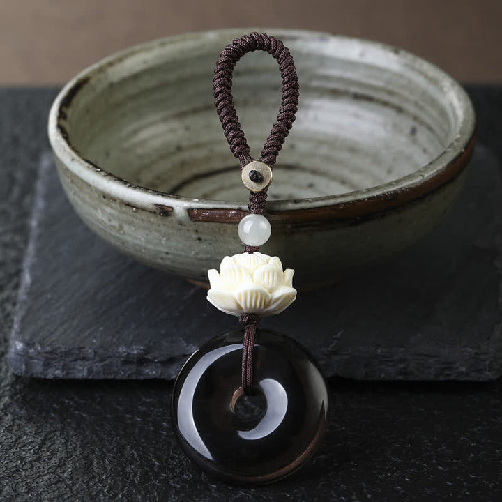 Buddha Stones Regenboogobsidiaan lotus vredesgesp bescherming Sleutelhangers - Lotus - IJs Obsidiaan Vredesgesp Sleutelhanger - Regenboogobsidiaan (kleur verandert in het licht) - image 1