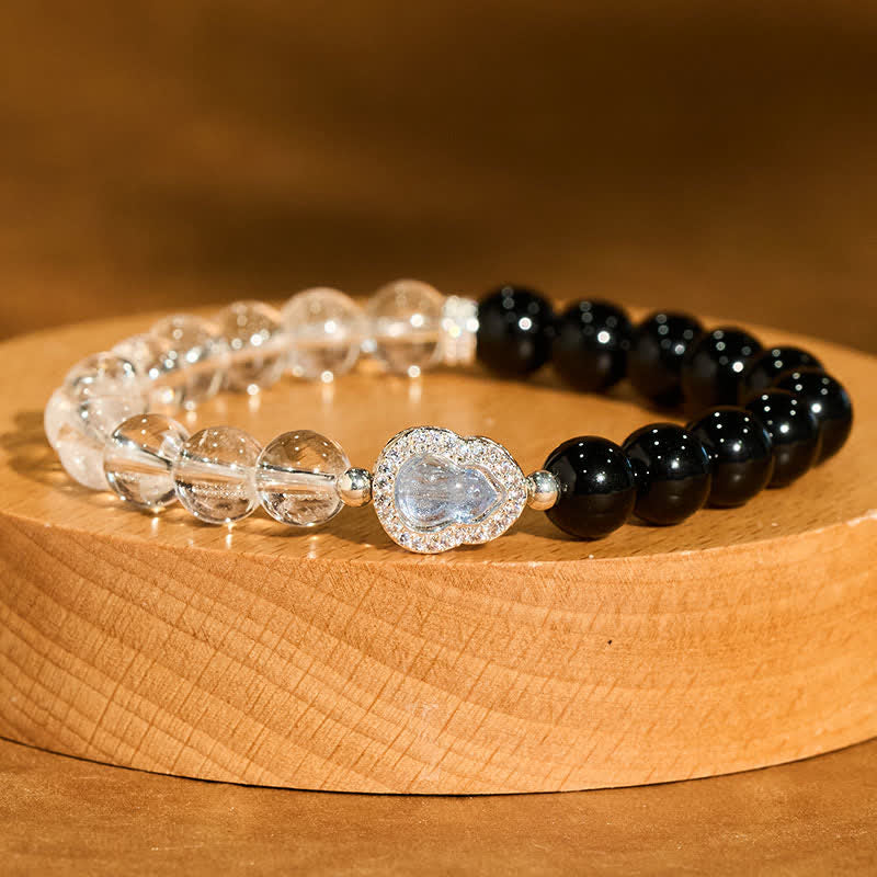 Buddha Stones Heldere kwarts armband met zwarte obsidiaan en kalebas - image 1