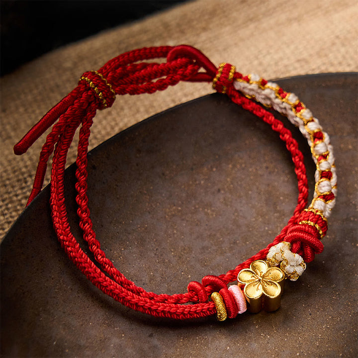 Buddha Stones Handgeweven armband met perzikbloesemmotief en dubbele laag . - Rood - Met perzikbloesemaccessoire - image 0