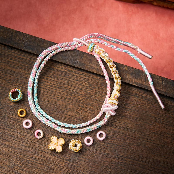Buddha Stones Handgeweven armband met perzikbloesemmotief en dubbele laag . - image 11