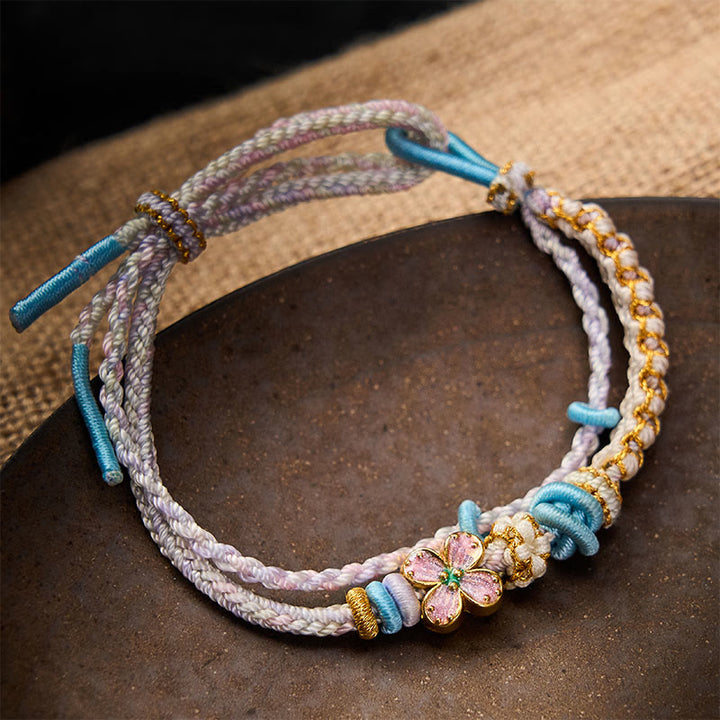 Buddha Stones Handgeweven armband met perzikbloesemmotief en dubbele laag . - Distel - Met paarse bloem als accessoire - image 15