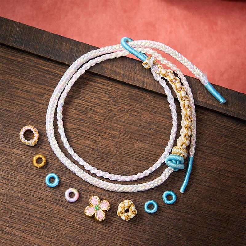 Buddha Stones Handgeweven armband met perzikbloesemmotief en dubbele laag . - image 18