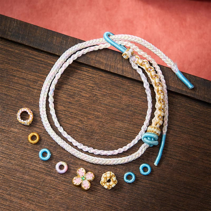 Buddha Stones Handgeweven armband met perzikbloesemmotief en dubbele laag . - image 18