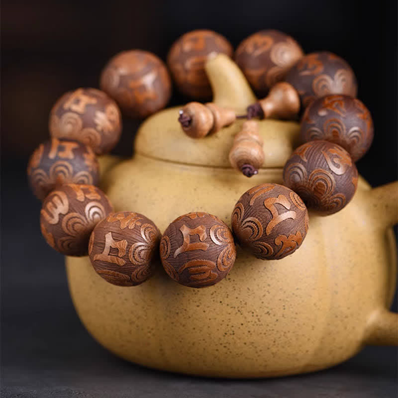Buddha Stones Natuurlijke Abelia Biflora houten hart Sutra Om Mani Padme Hum Armband - image 1