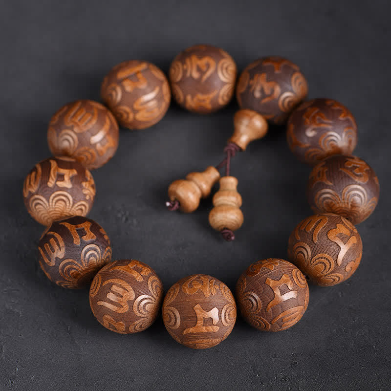 Buddha Stones Natuurlijke Abelia Biflora houten hart Sutra Om Mani Padme Hum Armband - Om Mani Padme Hum - image 0