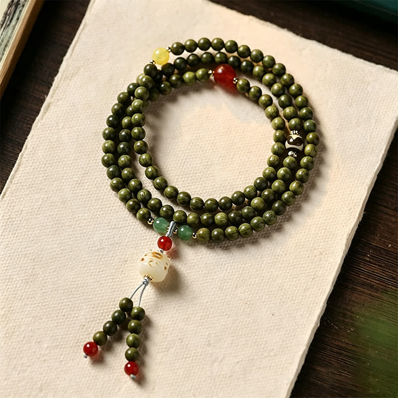 Buddha Stones Groene sandelhouten Serenity handgeweven kattenhanger in retro etnische Mala. - Groene sandelhout (Rustige energie ♥ Spiritueel evenwicht) - image 0