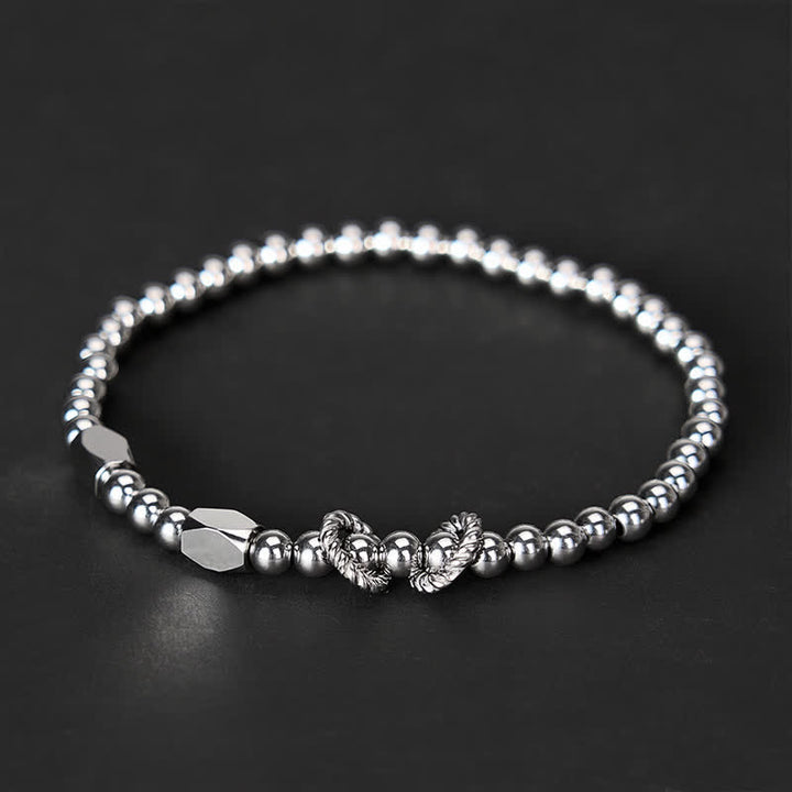 Buddha Stones Stimulerende Armband van titaniumstaal met kleine kralen van 4 mm - Polsomtrek: 7,9–8,2 inch (20–21 cm) - image 0