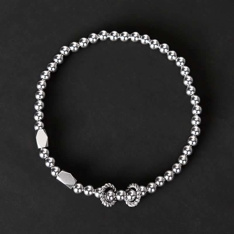 Buddha Stones Stimulerende Armband van titaniumstaal met kleine kralen van 4 mm - image 1