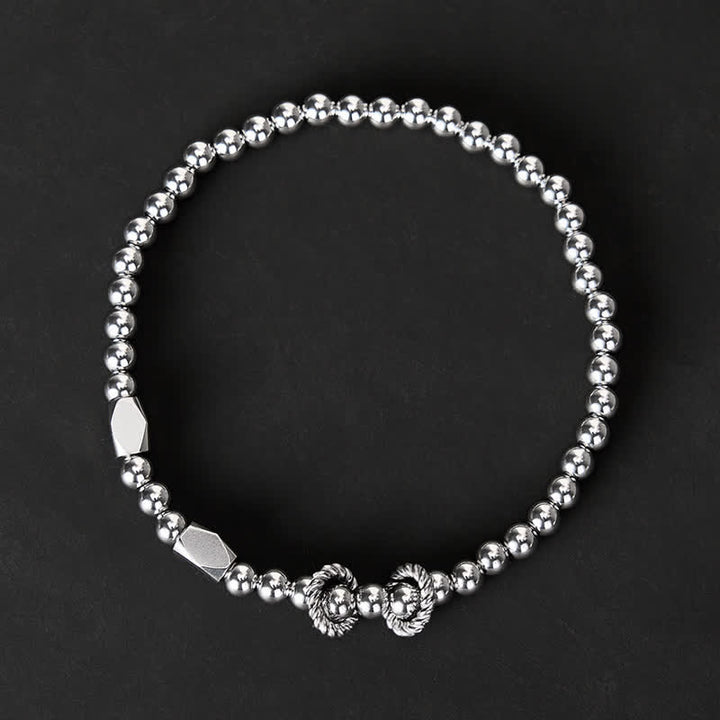Buddha Stones Stimulerende Armband van titaniumstaal met kleine kralen van 4 mm - image 1