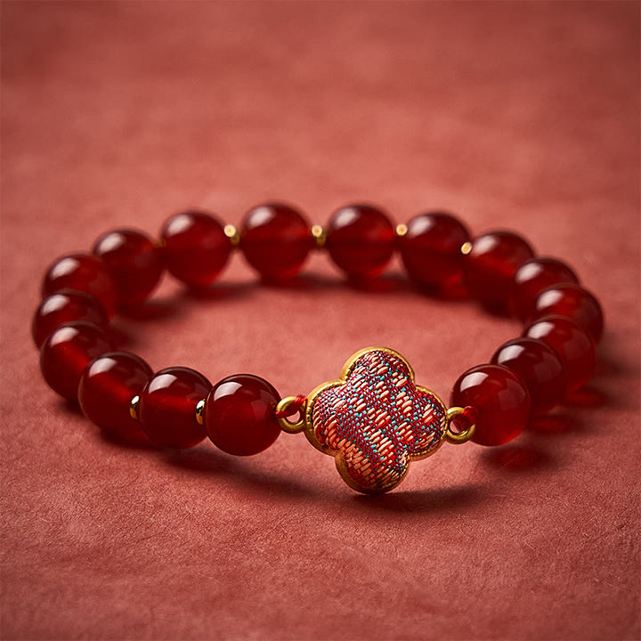 Buddha Stones Armband met bedeltje van rode agaat brokaat klavertje vier - Rode agaat (zelfde kleurtint – patroon varieert) - image 0