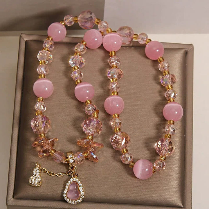 Buddha Stones Dubbellaagse Armband met hanger in de vorm van een kattenoogpompoen - image 2