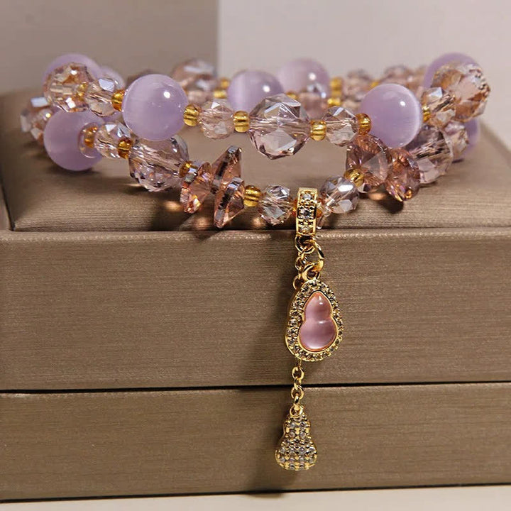 Buddha Stones Dubbellaagse Armband met hanger in de vorm van een kattenoogpompoen - image 11