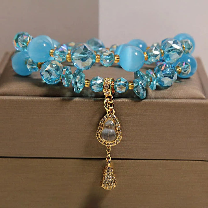 Buddha Stones Dubbellaagse Armband met hanger in de vorm van een kattenoogpompoen - Blauwe kattenoog - image 12