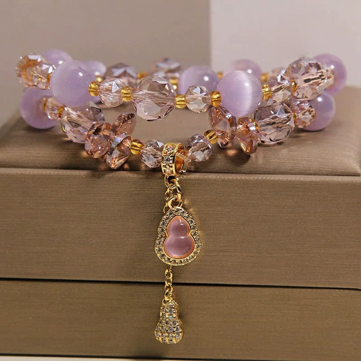 Buddha Stones Dubbellaagse Armband met hanger in de vorm van een kattenoogpompoen - image 10