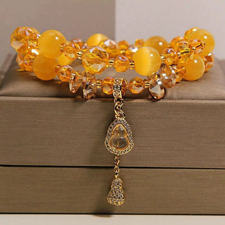 Buddha Stones Dubbellaagse Armband met hanger in de vorm van een kattenoogpompoen - image 6