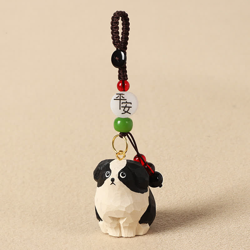 Buddha Stones Sleutelhangers van gesneden houten hondje Om Mani Padme Hum Wijsheid - Veilige zwart-witte hond - image 1