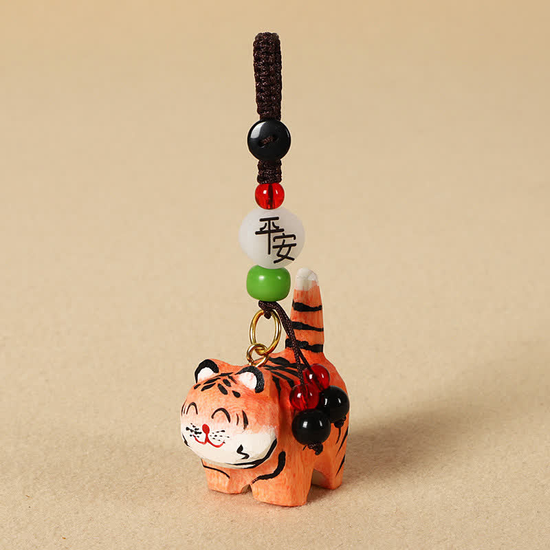 Buddha Stones Sleutelhangers met een uitgesneden houten tijger , Om Mani Padme Hum Focus - Veilige Tijger - image 1