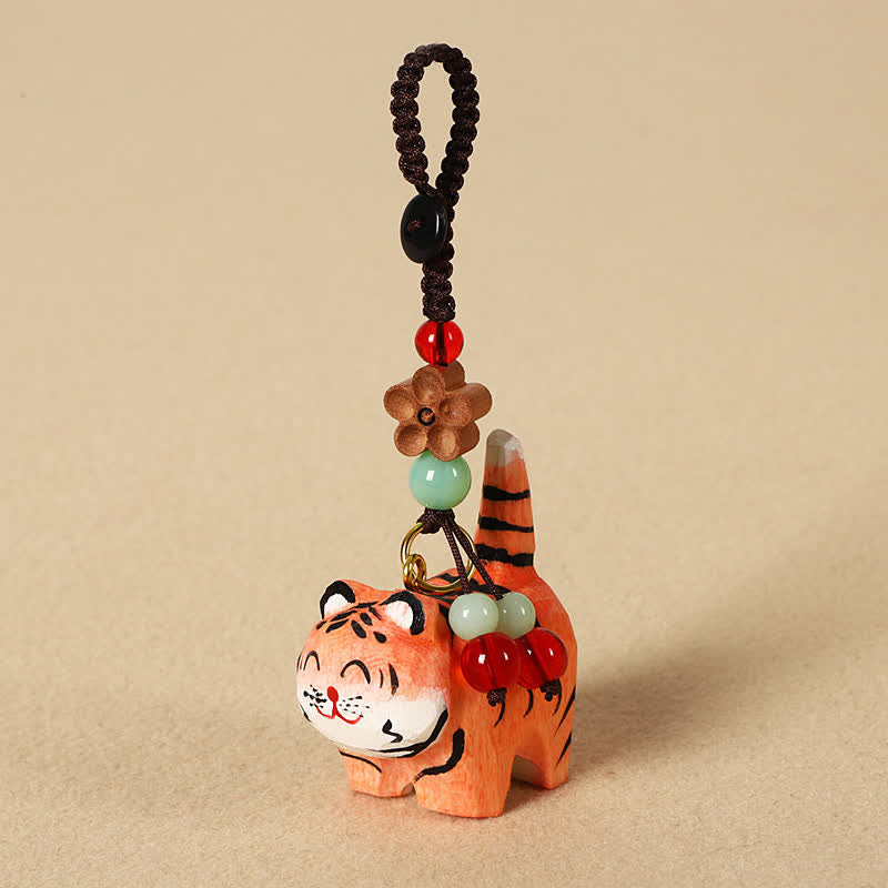 Buddha Stones Sleutelhangers met een uitgesneden houten tijger , Om Mani Padme Hum Focus - Tijger - image 0