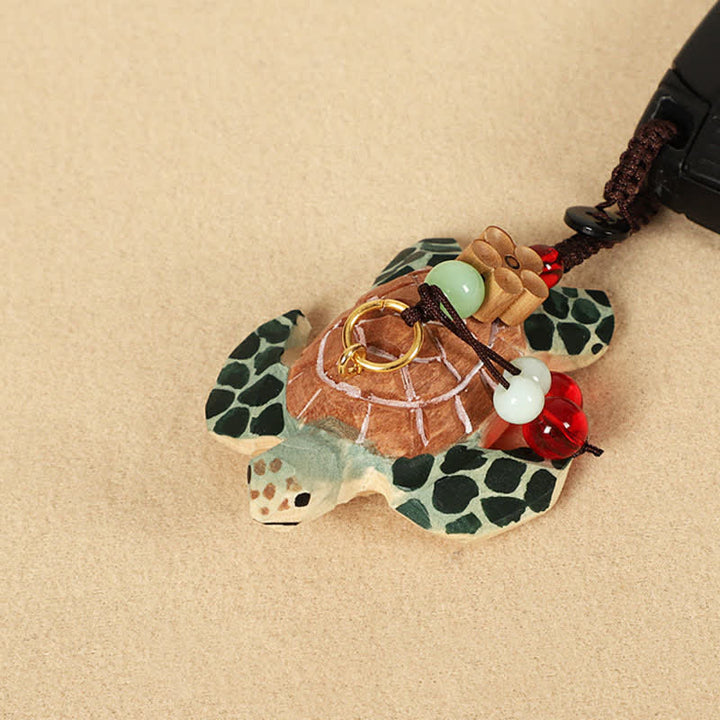 Buddha Stones Sleutelhangers met uitgesneden houten schildpad Om Mani Padme Hum Focus - image 2