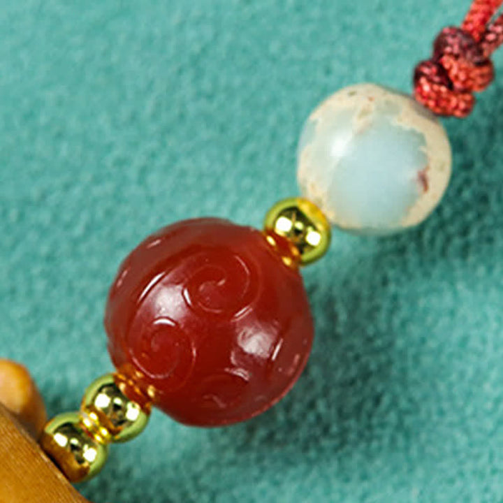 Buddha Stones Handgesneden sandelhouten Sleutelhangers met meervalmotief voor zuivering. - image 10