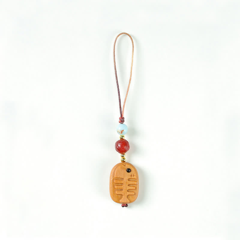 Buddha Stones Handgesneden sandelhouten Sleutelhangers met meervalmotief voor zuivering. - Vis - image 6