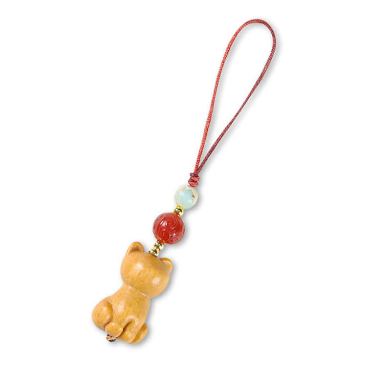 Buddha Stones Handgesneden sandelhouten Sleutelhangers met meervalmotief voor zuivering. - image 2