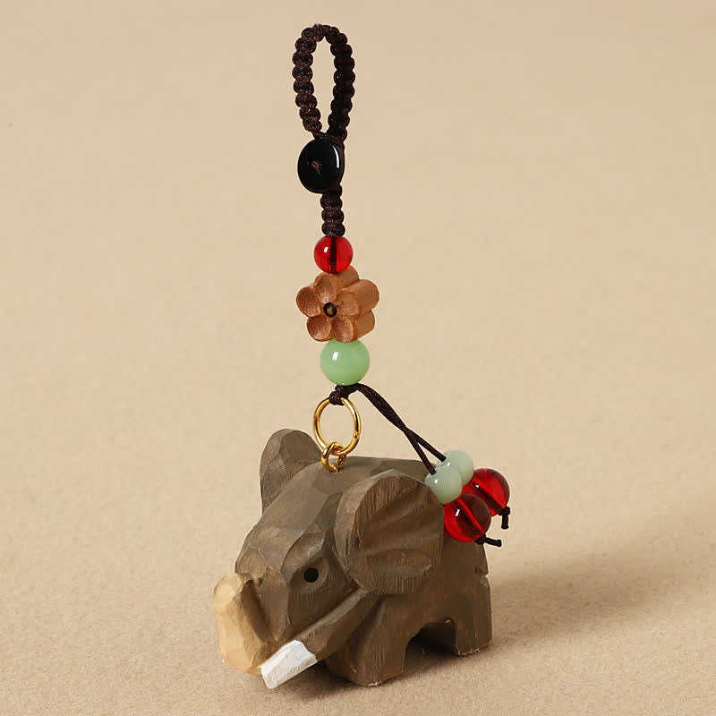Buddha Stones Sleutelhangers van natuurlijk hout met een olifant, symbool voor vrede , Om Mani Padme Hum en zuiverheid. - Olifantenpruimbloesem - image 1