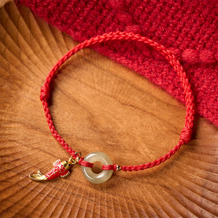 Buddha Stones Koi-vis bedeltje vredesgesp jade rode koord Armband - Natuurlijke jade (kleur kan variëren) - 16-18 cm - image 0