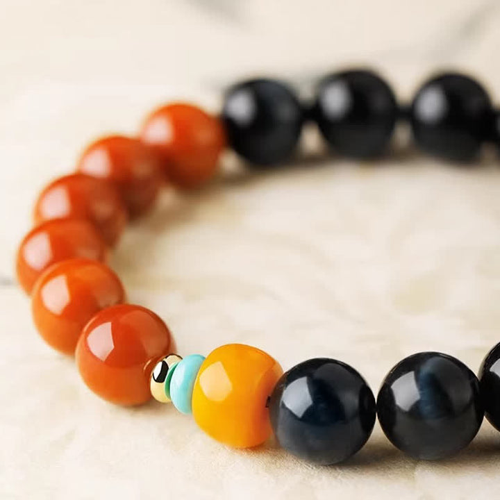 Buddha Stones Armband met ronde kralen van blauwe tijgeroog en Zuid-rode agaat. - image 4