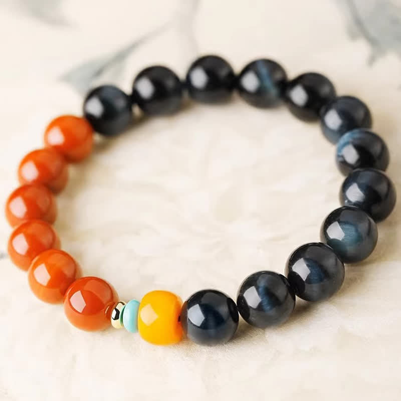 Buddha Stones Armband met ronde kralen van blauwe tijgeroog en Zuid-rode agaat. - image 1