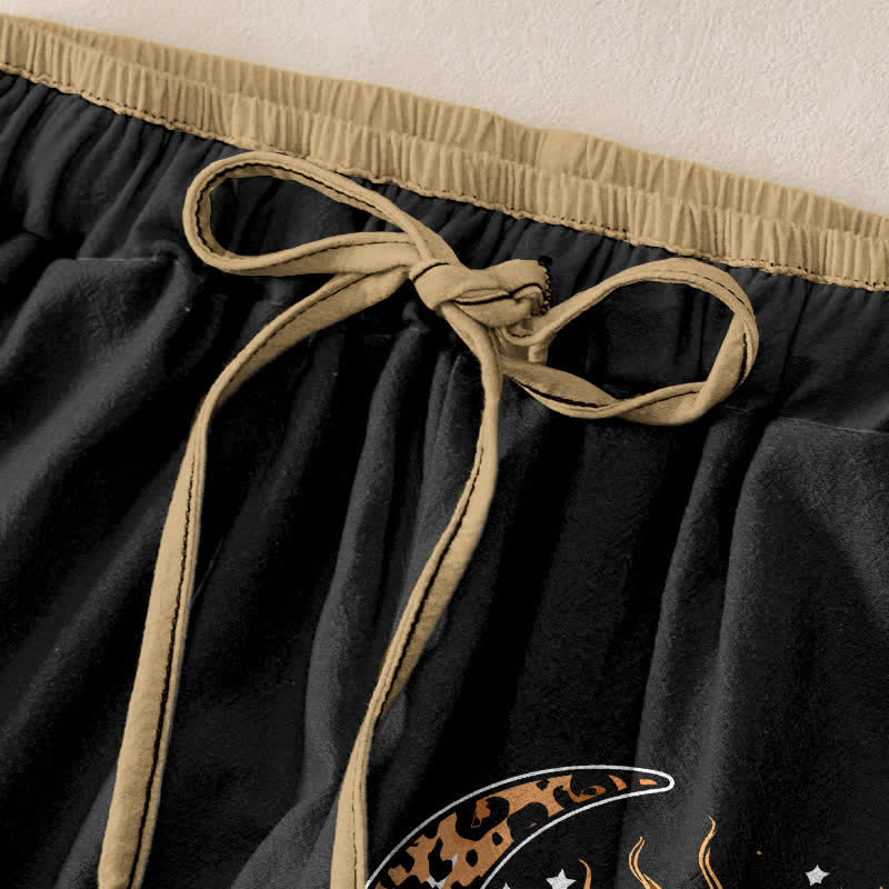 Buddha Stones Damesbroek van 100% Cotton met elastische Taille en Zakken , met een hemels zon- en maanpatroon. - image 1