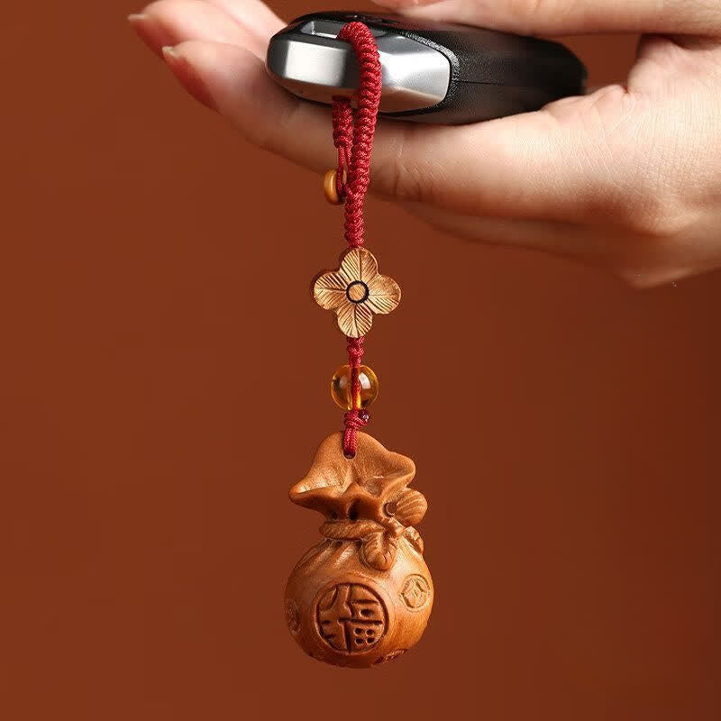 Buddha Stones Sleutelhangers met lotusbloemmotief en afbeelding van perzikhout. - image 4