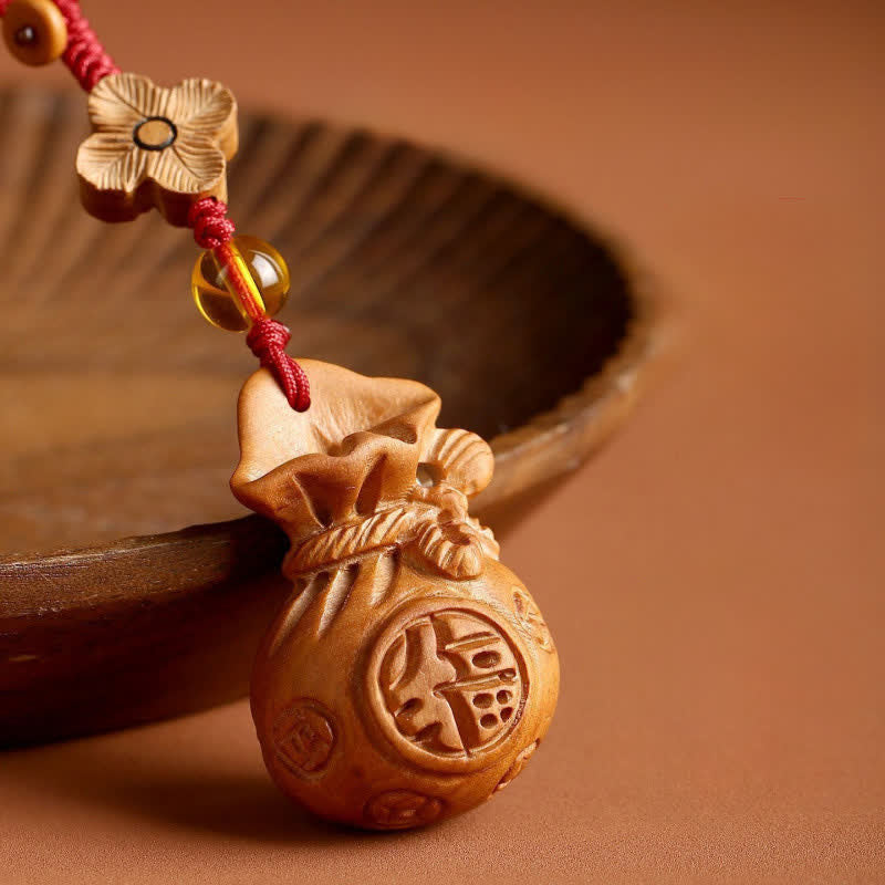 Buddha Stones Sleutelhangers met lotusbloemmotief en afbeelding van perzikhout. - image 2