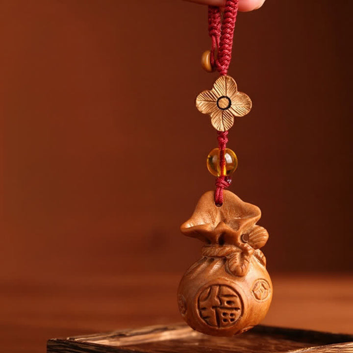 Buddha Stones Sleutelhangers met lotusbloemmotief en afbeelding van perzikhout. - Pruimenbloesem Rode Touw - image 1