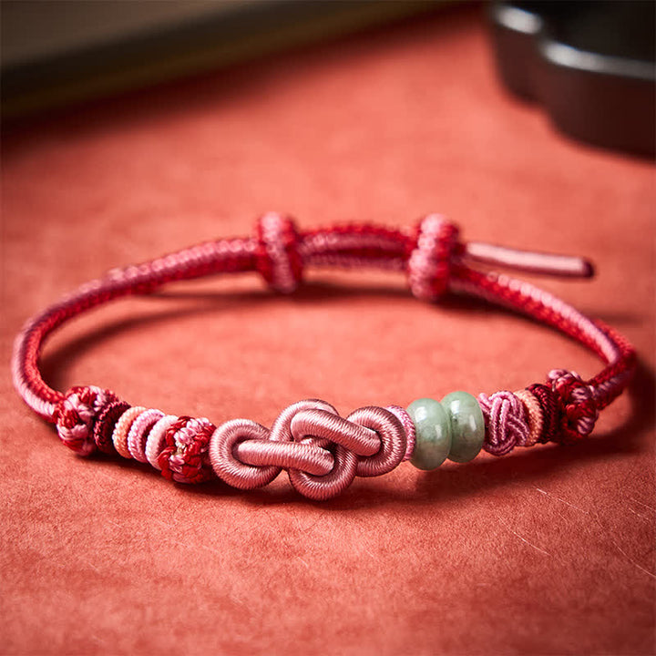 Buddha Stones Handgeweven armband met jade kralen en roze Armband - Roze met jade kralen - image 0