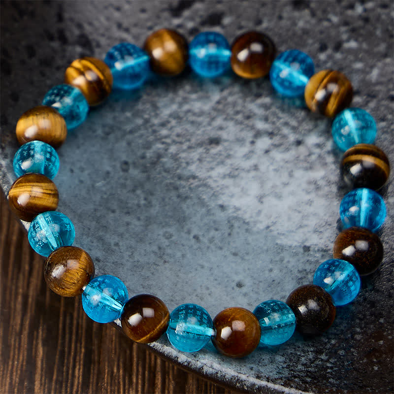 Buddha Stones Ronde Armband met tijgeroogblauwe Liuli-glaskralen en de tekst &
