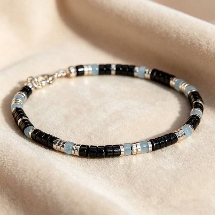 Buddha Stones Beschermende elastische Armband met zwarte onyx en blauwe chalcedoon - image 1