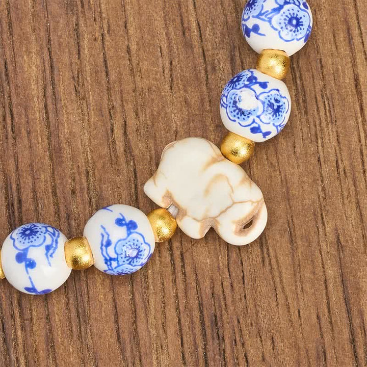 Buddha Stones Witte porseleinen olifant Armband met ronde kralen - image 8