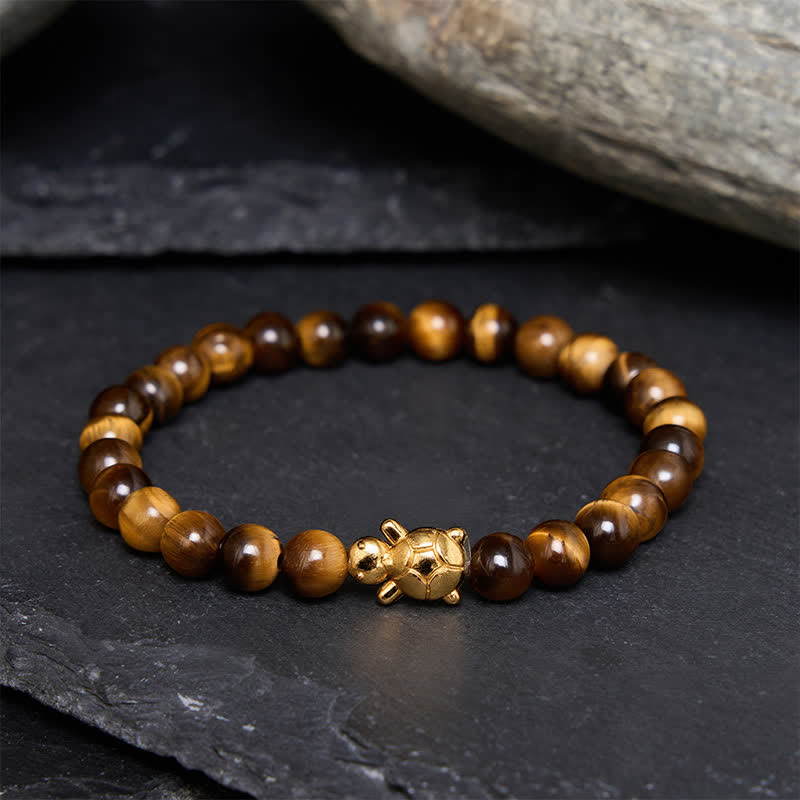 Buddha Stones Accessoires met natuurlijke tijgeroogkralen en schildpadmotief - 6mm tijgeroog (Polsomtrek: 14-15 cm) - image 0