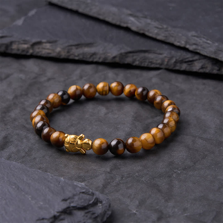 Buddha Stones Accessoires met natuurlijke tijgeroogkralen en schildpadmotief - image 2