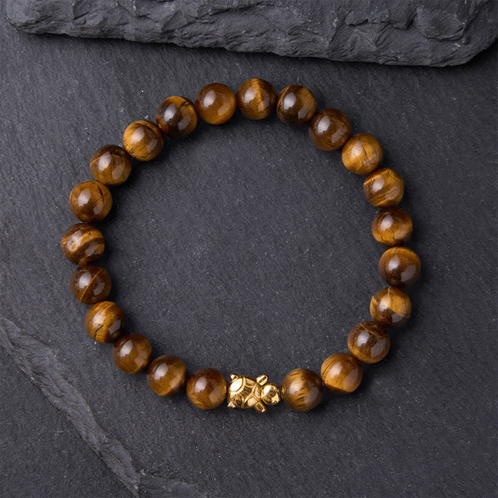 Buddha Stones Accessoires met natuurlijke tijgeroogkralen en schildpadmotief - image 10