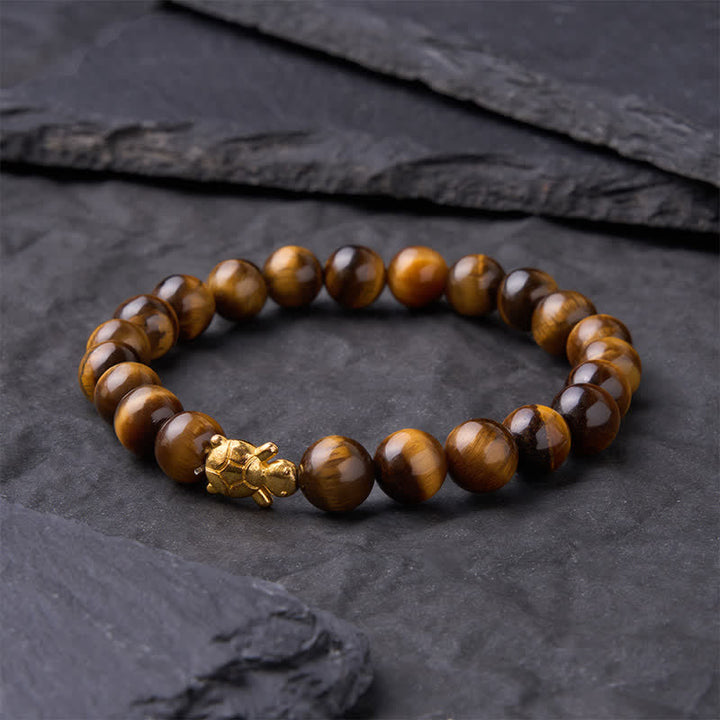 Buddha Stones Accessoires met natuurlijke tijgeroogkralen en schildpadmotief - image 11